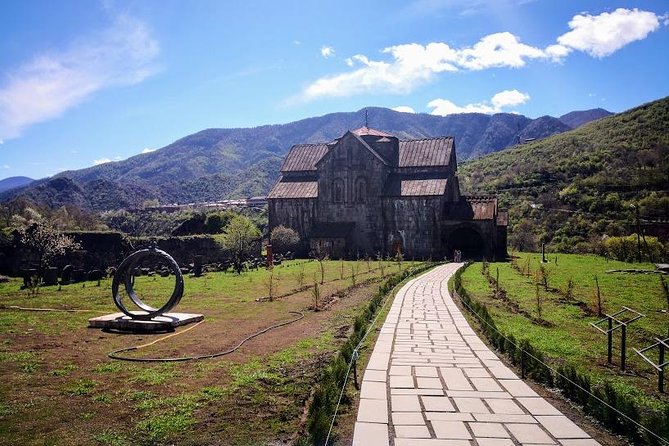 Private Transfer & Tour from Tbilisi to Yerevan or Yerevan to Tbilisi - Sevanavank Monastery: lake views from the Sevan peninsula